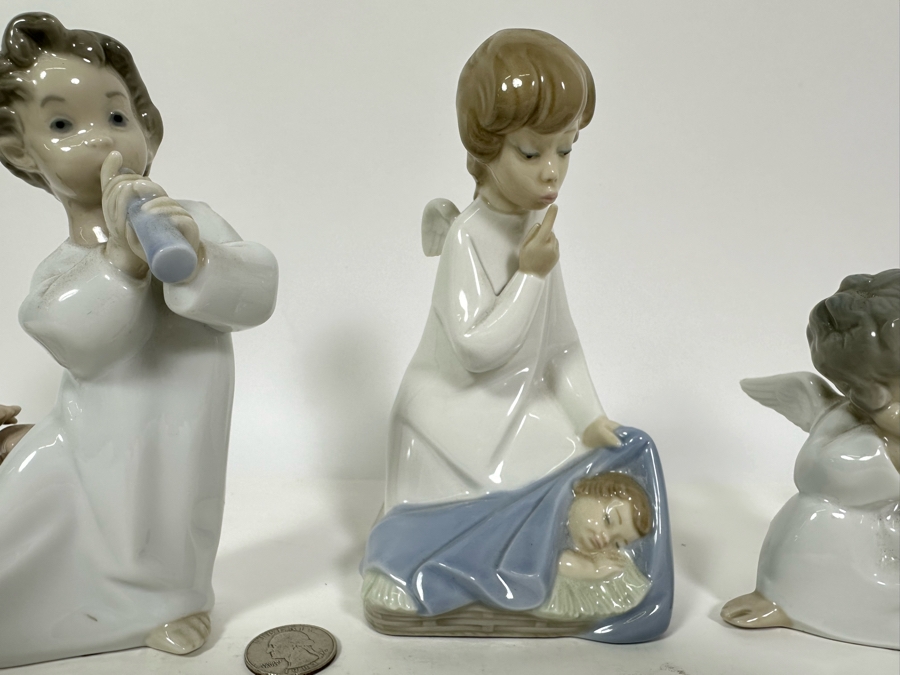 Collection Of Four Lladro Angel Figurines