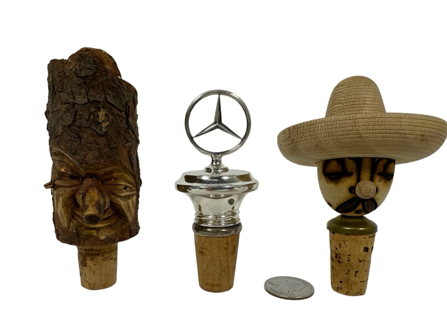 (3) Wine Stoppers: Carved Wood Figures And Mercedes Benz Logo