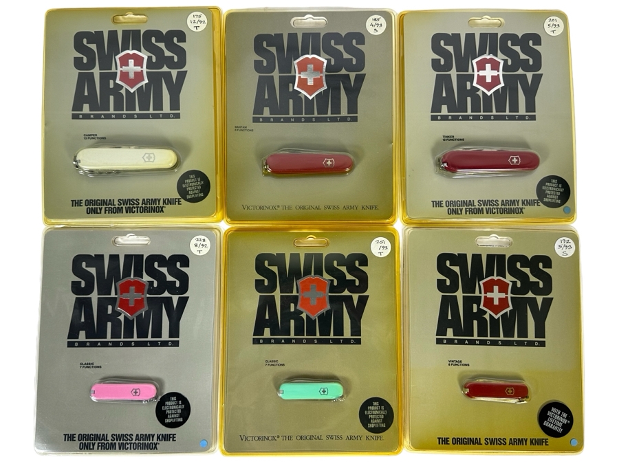 Six New In Packaging Swiss Army Knives Including The Camper Knife, Bantam Knife, Tinker Knife, (2) Classic Knives And Vintage Knife