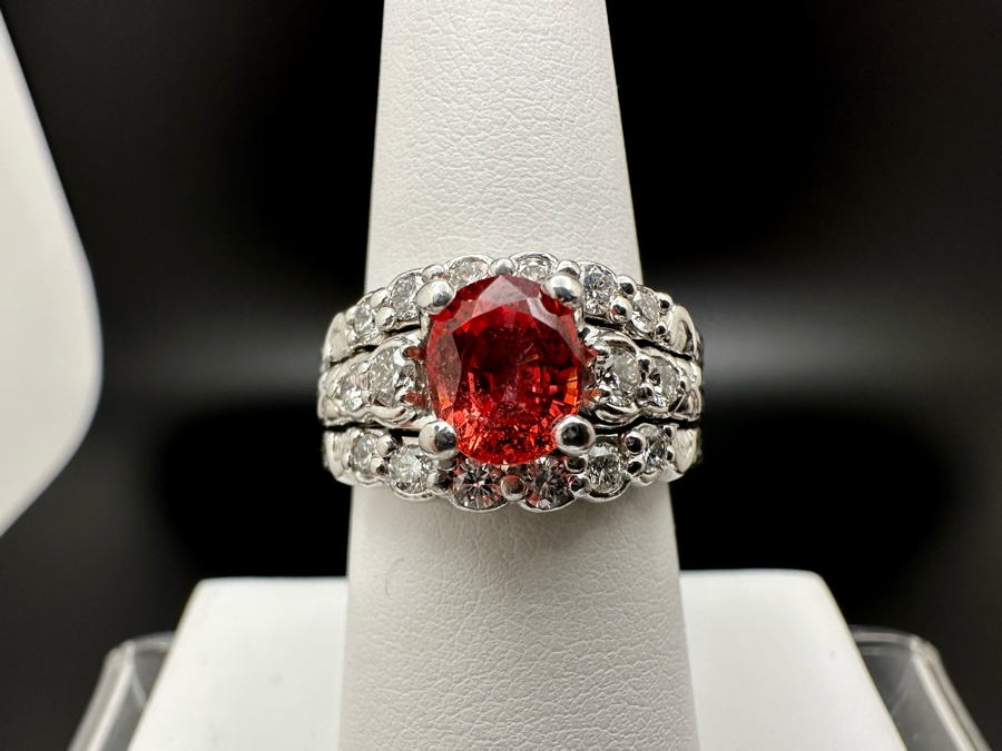 Stunning Platinum 950 Orange Sapphire Ring With 16 Round Brilliant Cut Diamonds Est. 0.60cttw 7.78mm X 6mm Orange Sapphire Size 7.25 15.4g Estimate Fair Market Value $3,500 Retail Value $10,500 [Photo 2]