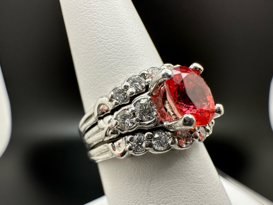 Stunning Platinum 950 Orange Sapphire Ring With 16 Round Brilliant Cut Diamonds Est. 0.60cttw 7.78mm X 6mm Orange Sapphire Size 7.25 15.4g Estimate Fair Market Value $3,500 Retail Value $10,500 [Photo 7]