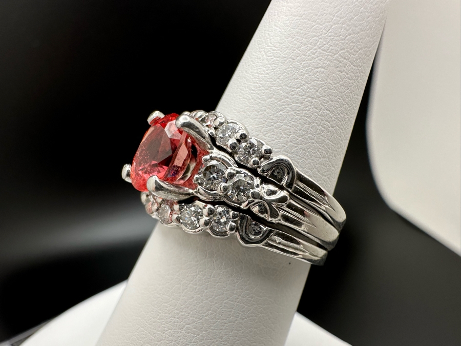 Stunning Platinum 950 Orange Sapphire Ring With 16 Round Brilliant Cut Diamonds Est. 0.60cttw 7.78mm X 6mm Orange Sapphire Size 7.25 15.4g Estimate Fair Market Value $3,500 Retail Value $10,500 [Photo 9]