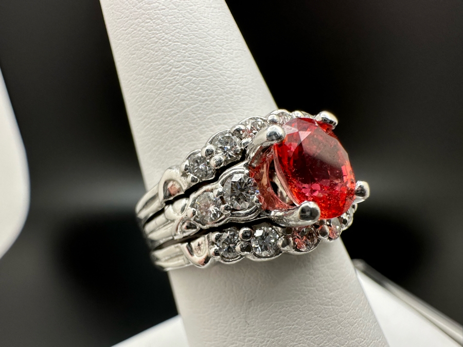 Stunning Platinum 950 Orange Sapphire Ring With 16 Round Brilliant Cut Diamonds Est. 0.60cttw 7.78mm X 6mm Orange Sapphire Size 7.25 15.4g Estimate Fair Market Value $3,500 Retail Value $10,500 [Photo 6]