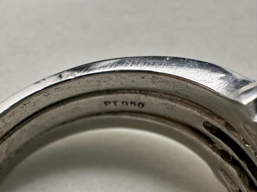 Stunning Platinum 950 Orange Sapphire Ring With 16 Round Brilliant Cut Diamonds Est. 0.60cttw 7.78mm X 6mm Orange Sapphire Size 7.25 15.4g Estimate Fair Market Value $3,500 Retail Value $10,500 [Photo 15]