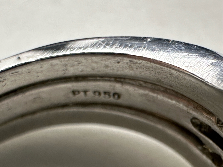 Stunning Platinum 950 Orange Sapphire Ring With 16 Round Brilliant Cut Diamonds Est. 0.60cttw 7.78mm X 6mm Orange Sapphire Size 7.25 15.4g Estimate Fair Market Value $3,500 Retail Value $10,500 [Photo 16]