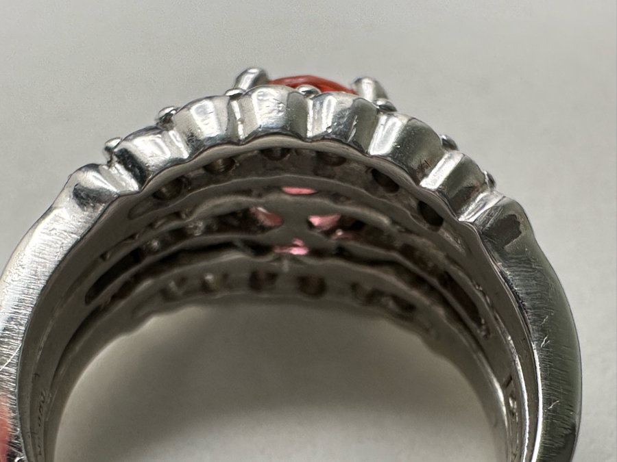 Stunning Platinum 950 Orange Sapphire Ring With 16 Round Brilliant Cut Diamonds Est. 0.60cttw 7.78mm X 6mm Orange Sapphire Size 7.25 15.4g Estimate Fair Market Value $3,500 Retail Value $10,500 [Photo 17]