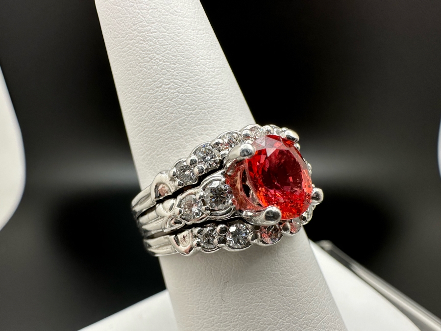 Stunning Platinum 950 Orange Sapphire Ring With 16 Round Brilliant Cut Diamonds Est. 0.60cttw 7.78mm X 6mm Orange Sapphire Size 7.25 15.4g Estimate Fair Market Value $3,500 Retail Value $10,500 [Photo 5]