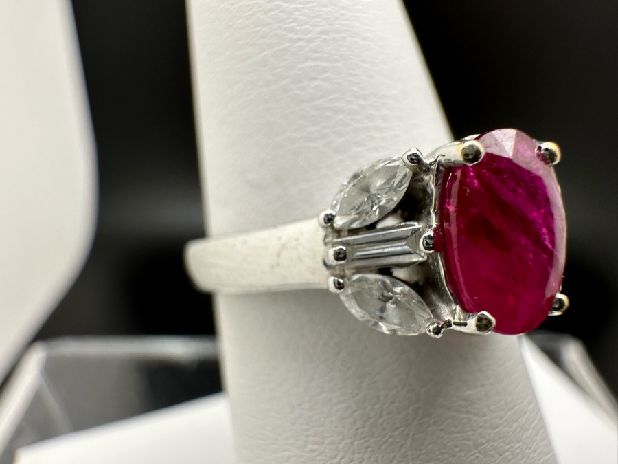 18K Gold Oval Shape Ruby (Lead Glass Fracture Filled) Accented With 2 Baguette Diamonds And 4 Marquise Shape Diamonds G-H Color Si1 Clarity Est. .40cttw Ruby 8mm X 6mm Size 7.25 5.2g Estimated Fair Market Value $1,200 Retail $3,600 [Photo 5]