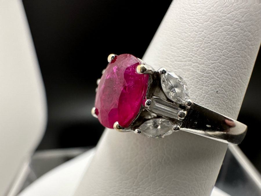 18K Gold Oval Shape Ruby (Lead Glass Fracture Filled) Accented With 2 Baguette Diamonds And 4 Marquise Shape Diamonds G-H Color Si1 Clarity Est. .40cttw Ruby 8mm X 6mm Size 7.25 5.2g Estimated Fair Market Value $1,200 Retail $3,600 [Photo 8]