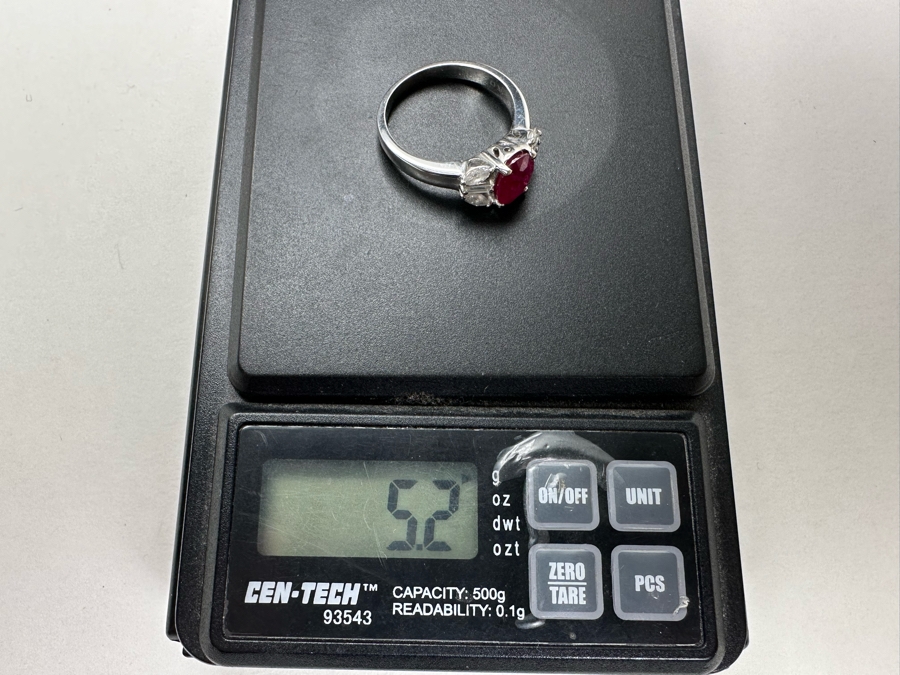 18K Gold Oval Shape Ruby (Lead Glass Fracture Filled) Accented With 2 Baguette Diamonds And 4 Marquise Shape Diamonds G-H Color Si1 Clarity Est. .40cttw Ruby 8mm X 6mm Size 7.25 5.2g Estimated Fair Market Value $1,200 Retail $3,600 [Photo 13]