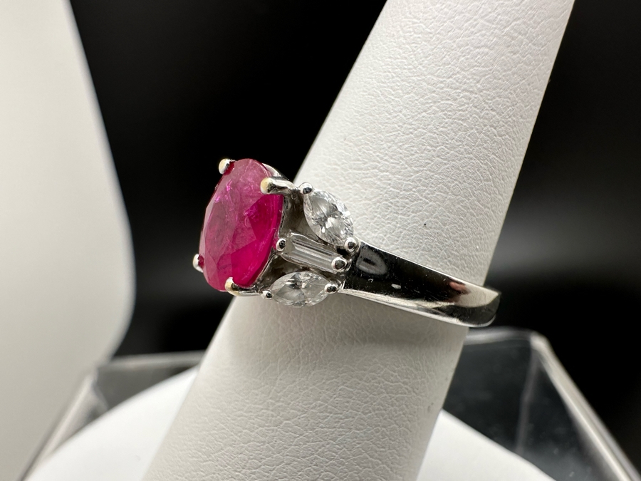 18K Gold Oval Shape Ruby (Lead Glass Fracture Filled) Accented With 2 Baguette Diamonds And 4 Marquise Shape Diamonds G-H Color Si1 Clarity Est. .40cttw Ruby 8mm X 6mm Size 7.25 5.2g Estimated Fair Market Value $1,200 Retail $3,600 [Photo 7]