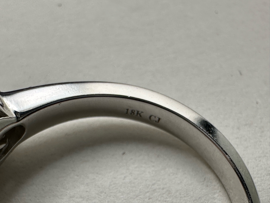 18K Gold Oval Shape Ruby (Lead Glass Fracture Filled) Accented With 2 Baguette Diamonds And 4 Marquise Shape Diamonds G-H Color Si1 Clarity Est. .40cttw Ruby 8mm X 6mm Size 7.25 5.2g Estimated Fair Market Value $1,200 Retail $3,600 [Photo 11]