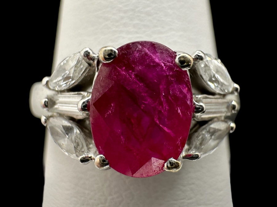 18K Gold Oval Shape Ruby (Lead Glass Fracture Filled) Accented With 2 Baguette Diamonds And 4 Marquise Shape Diamonds G-H Color Si1 Clarity Est. .40cttw Ruby 8mm X 6mm Size 7.25 5.2g Estimated Fair Market Value $1,200 Retail $3,600