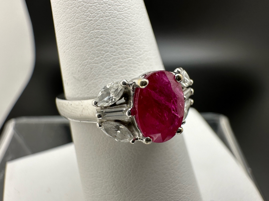 18K Gold Oval Shape Ruby (Lead Glass Fracture Filled) Accented With 2 Baguette Diamonds And 4 Marquise Shape Diamonds G-H Color Si1 Clarity Est. .40cttw Ruby 8mm X 6mm Size 7.25 5.2g Estimated Fair Market Value $1,200 Retail $3,600 [Photo 6]