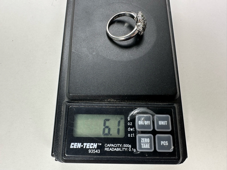 18K Gold Alexanderite Cluster Ring Set With 31 Natural Alexanderites Est. .81cttw Accented With 34 Round Brilliant Diamonds G-H Color VS Clarity Est. .35cttw Size 6.75 6.1g Estimated Fair Market Value $1,600 Retail Value $4,800 [Photo 14]