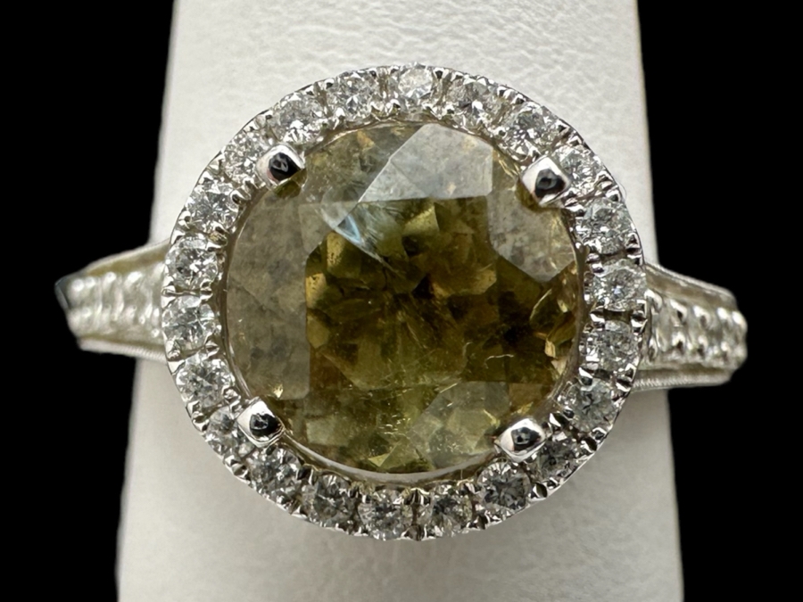 14K Gold Zultanite Ring Set With 60 Round Brilliant Diamonds Est. .75cttw Set With 2.32ct Diaspore (Zultanite) Size 7 5.4g Estimated Fair Market Value $2,000 Retail Value $6,000 [Photo 1]
