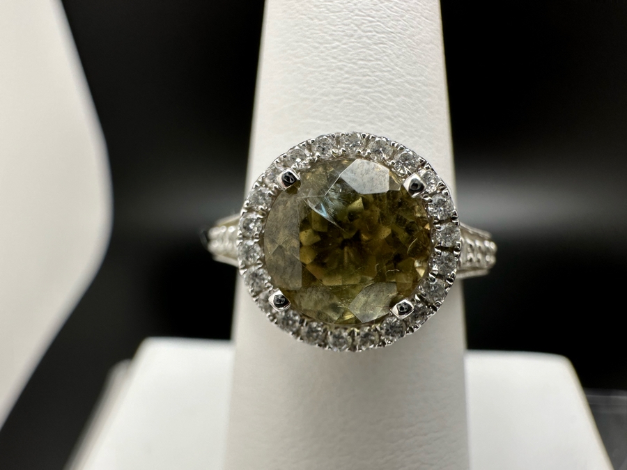 14K Gold Zultanite Ring Set With 60 Round Brilliant Diamonds Est. .75cttw Set With 2.32ct Diaspore (Zultanite) Size 7 5.4g Estimated Fair Market Value $2,000 Retail Value $6,000 [Photo 3]