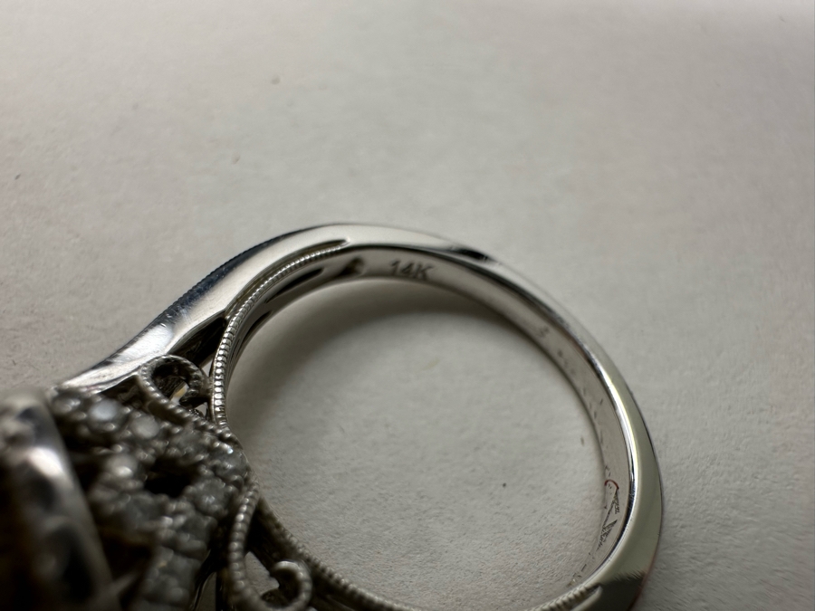 14K Gold Zultanite Ring Set With 60 Round Brilliant Diamonds Est. .75cttw Set With 2.32ct Diaspore (Zultanite) Size 7 5.4g Estimated Fair Market Value $2,000 Retail Value $6,000 [Photo 19]