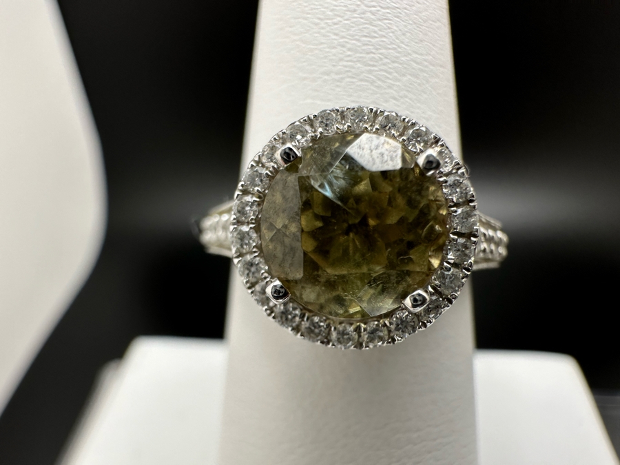 14K Gold Zultanite Ring Set With 60 Round Brilliant Diamonds Est. .75cttw Set With 2.32ct Diaspore (Zultanite) Size 7 5.4g Estimated Fair Market Value $2,000 Retail Value $6,000 [Photo 4]