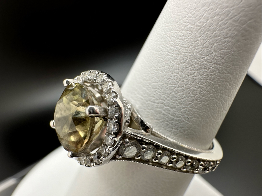 14K Gold Zultanite Ring Set With 60 Round Brilliant Diamonds Est. .75cttw Set With 2.32ct Diaspore (Zultanite) Size 7 5.4g Estimated Fair Market Value $2,000 Retail Value $6,000 [Photo 17]