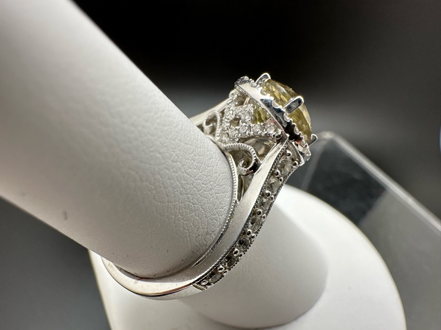 14K Gold Zultanite Ring Set With 60 Round Brilliant Diamonds Est. .75cttw Set With 2.32ct Diaspore (Zultanite) Size 7 5.4g Estimated Fair Market Value $2,000 Retail Value $6,000 [Photo 12]