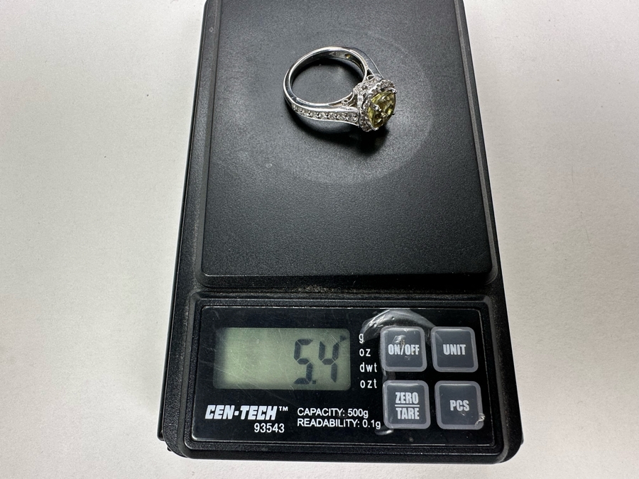 14K Gold Zultanite Ring Set With 60 Round Brilliant Diamonds Est. .75cttw Set With 2.32ct Diaspore (Zultanite) Size 7 5.4g Estimated Fair Market Value $2,000 Retail Value $6,000 [Photo 22]