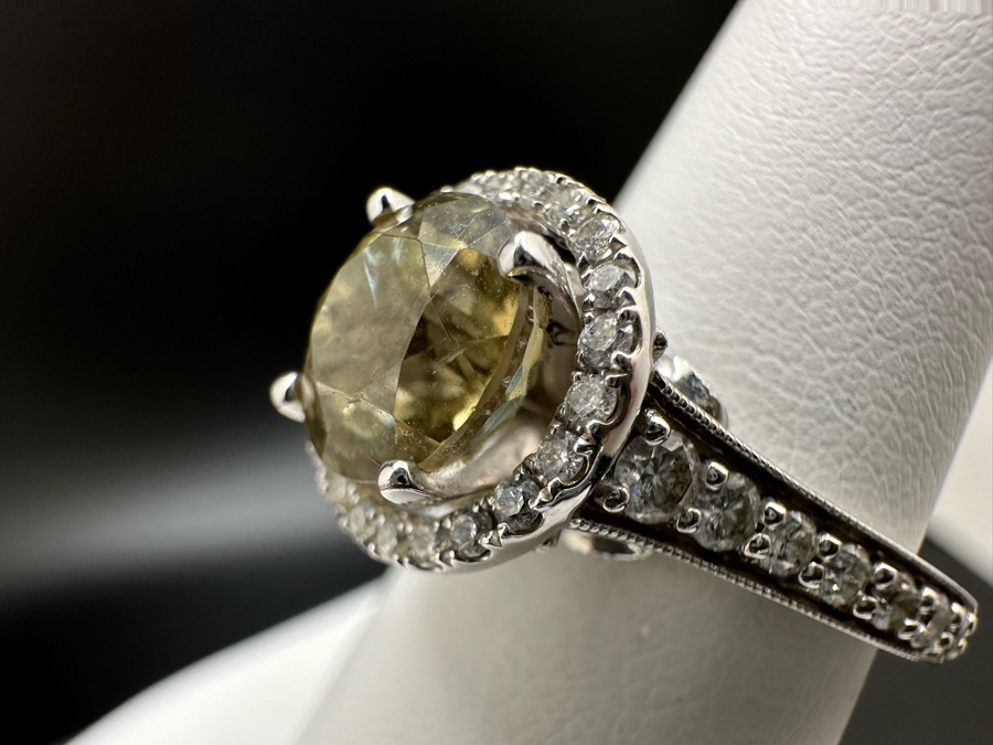 14K Gold Zultanite Ring Set With 60 Round Brilliant Diamonds Est. .75cttw Set With 2.32ct Diaspore (Zultanite) Size 7 5.4g Estimated Fair Market Value $2,000 Retail Value $6,000 [Photo 14]