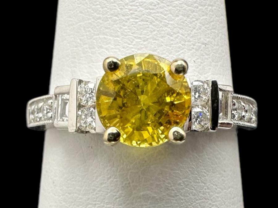 18K Gold Golden Quartz Ring 1.54RI Double Refractive 6mm Round Brilliant Cut Est. 1cttw Set With Diamonds Est. .26cttw Size 6.25 3.5g Estimated Fair Market Value $800 Retails $2,400 [Photo 1]