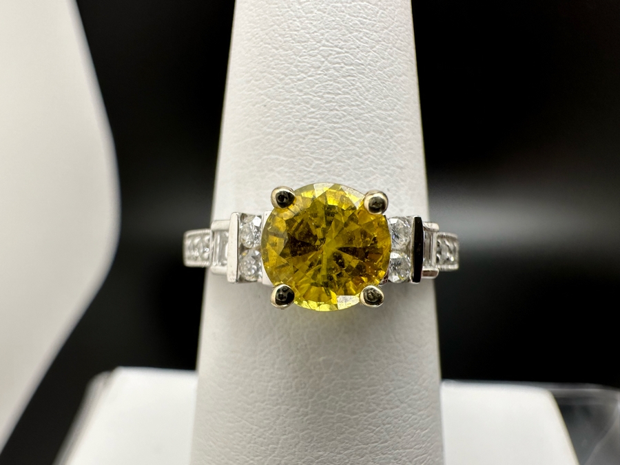 18K Gold Golden Quartz Ring 1.54RI Double Refractive 6mm Round Brilliant Cut Est. 1cttw Set With Diamonds Est. .26cttw Size 6.25 3.5g Estimated Fair Market Value $800 Retails $2,400 [Photo 6]