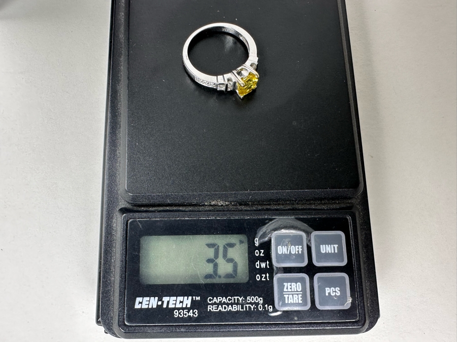 18K Gold Golden Quartz Ring 1.54RI Double Refractive 6mm Round Brilliant Cut Est. 1cttw Set With Diamonds Est. .26cttw Size 6.25 3.5g Estimated Fair Market Value $800 Retails $2,400 [Photo 19]