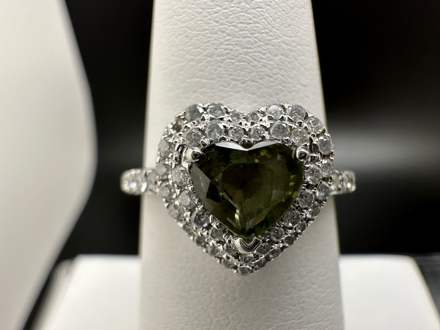 14K Gold Heart Shape Synthetic Alexanderite Ring Set With 52 Round Brilliant Diamonds Est. .40cttw Center Stone 6mm X 6mm Synthetic Alexanderite Est. 1cttw 3.1g Size 6.75 Estimated Fair Market Value $900 Retail Value $2,700 [Photo 6]