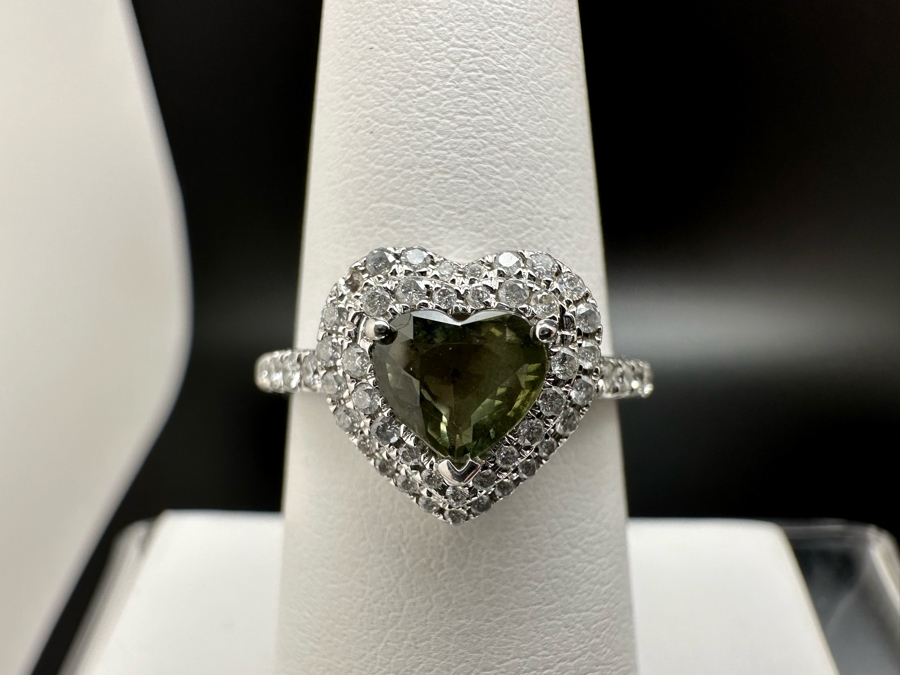 14K Gold Heart Shape Synthetic Alexanderite Ring Set With 52 Round Brilliant Diamonds Est. .40cttw Center Stone 6mm X 6mm Synthetic Alexanderite Est. 1cttw 3.1g Size 6.75 Estimated Fair Market Value $900 Retail Value $2,700 [Photo 3]