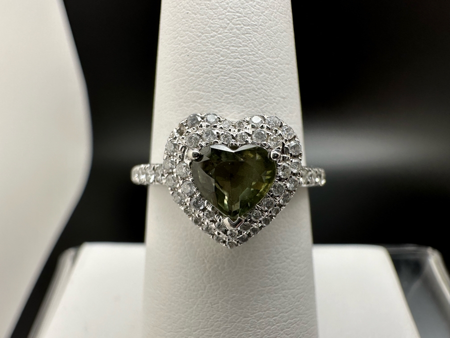 14K Gold Heart Shape Synthetic Alexanderite Ring Set With 52 Round Brilliant Diamonds Est. .40cttw Center Stone 6mm X 6mm Synthetic Alexanderite Est. 1cttw 3.1g Size 6.75 Estimated Fair Market Value $900 Retail Value $2,700 [Photo 2]