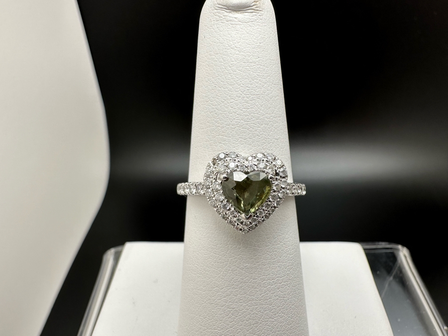 14K Gold Heart Shape Synthetic Alexanderite Ring Set With 52 Round Brilliant Diamonds Est. .40cttw Center Stone 6mm X 6mm Synthetic Alexanderite Est. 1cttw 3.1g Size 6.75 Estimated Fair Market Value $900 Retail Value $2,700 [Photo 5]