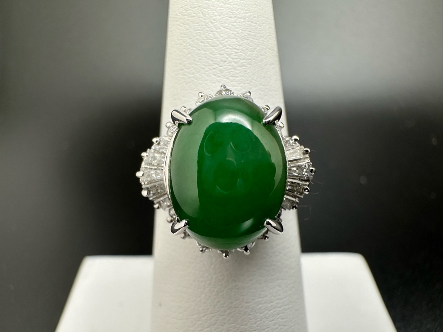 Platinum 900 Oval Green Jade 12.5mm X 9.75mm 4.6Ct Set With 14 1.5mm Round Brilliant Diamonds & 10 Tapered Baguette Diamonds Estimated .64cttw Ring Size 6.5 8.9g Estimated Value $1,675 [Photo 3]