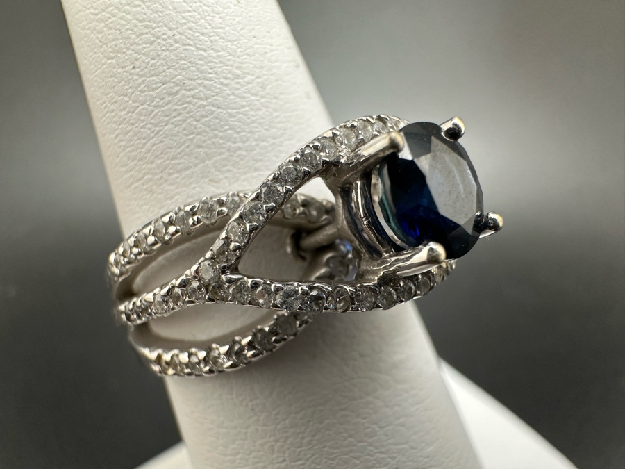 18K Gold Dark Blue Sapphire 6mm Est. 1.1Ct Set With 96 .01Ct Round Brilliant Diamonds Est. 1cttw 6.8g Size 6.5 Estimated Value $2,300 [Photo 7]