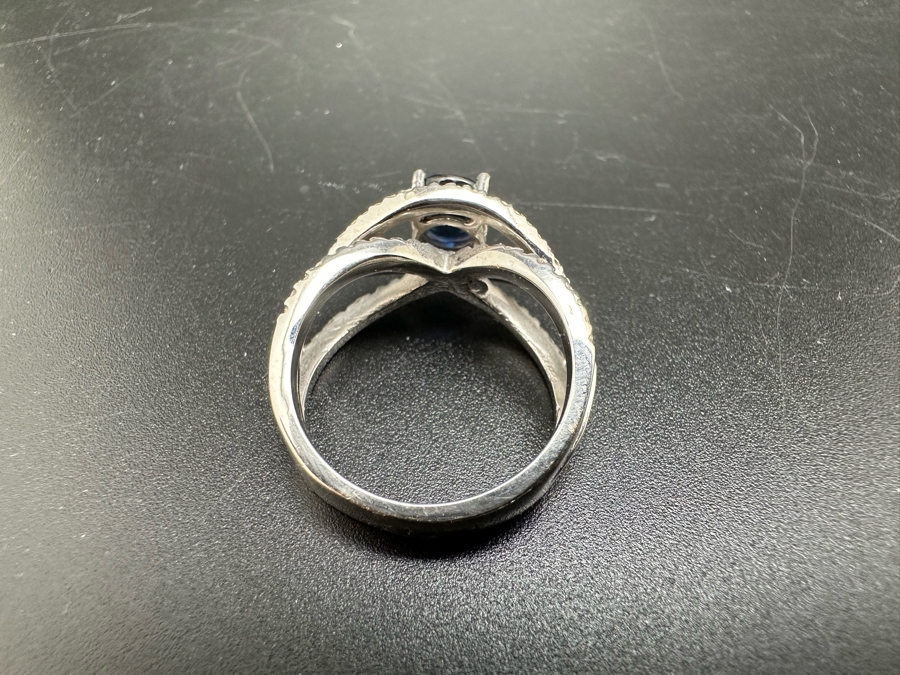 18K Gold Dark Blue Sapphire 6mm Est. 1.1Ct Set With 96 .01Ct Round Brilliant Diamonds Est. 1cttw 6.8g Size 6.5 Estimated Value $2,300 [Photo 10]