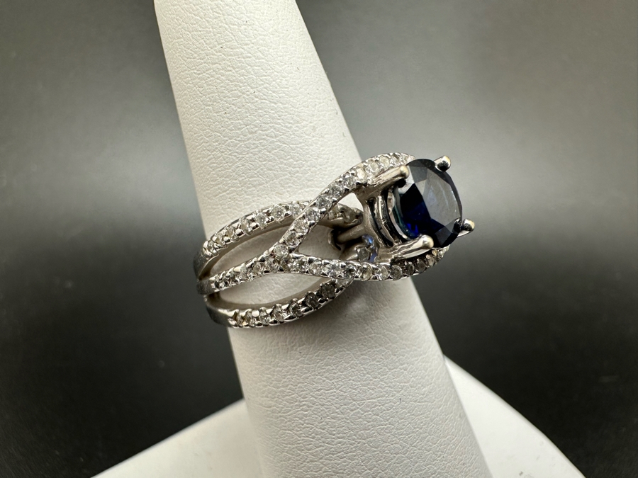 18K Gold Dark Blue Sapphire 6mm Est. 1.1Ct Set With 96 .01Ct Round Brilliant Diamonds Est. 1cttw 6.8g Size 6.5 Estimated Value $2,300 [Photo 5]
