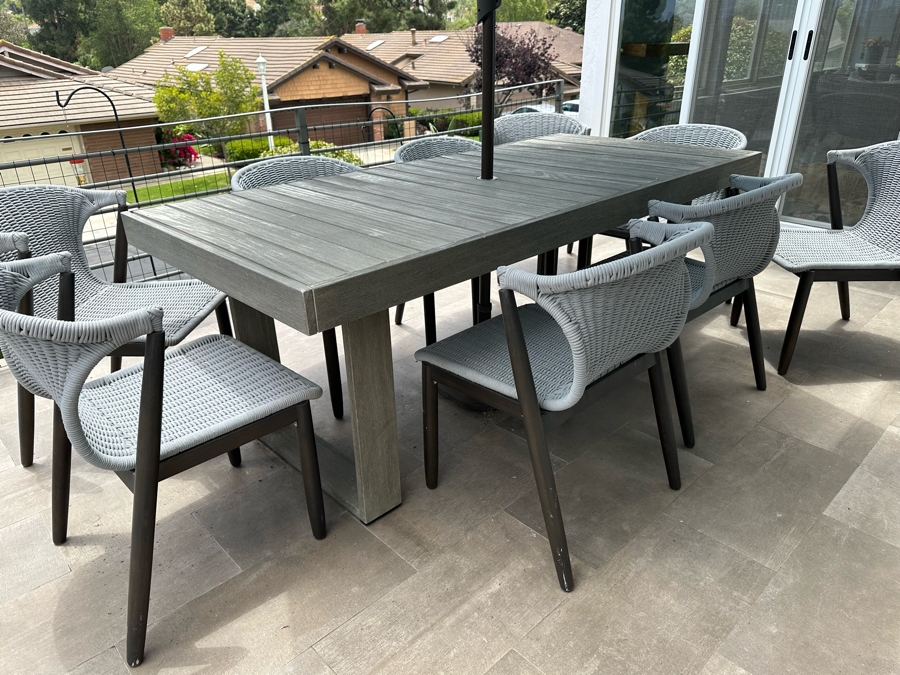 West Elm Outdoor Dining Table 77W X 36D X 30H With Umbrella And Nine AllModern Modernist Woven Rope Chairs (Nine Chairs Retails For $3,200) [Photo 3]