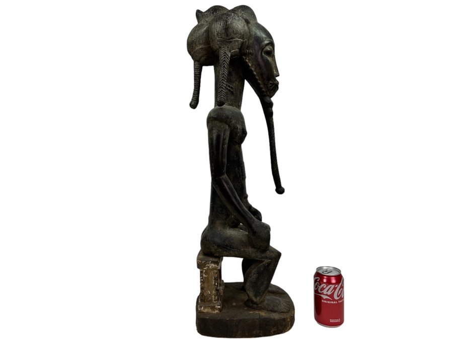 African Carved Wooden Sculpture From The Ivory Coast 28.5'H Estimate $400 [Photo 1]