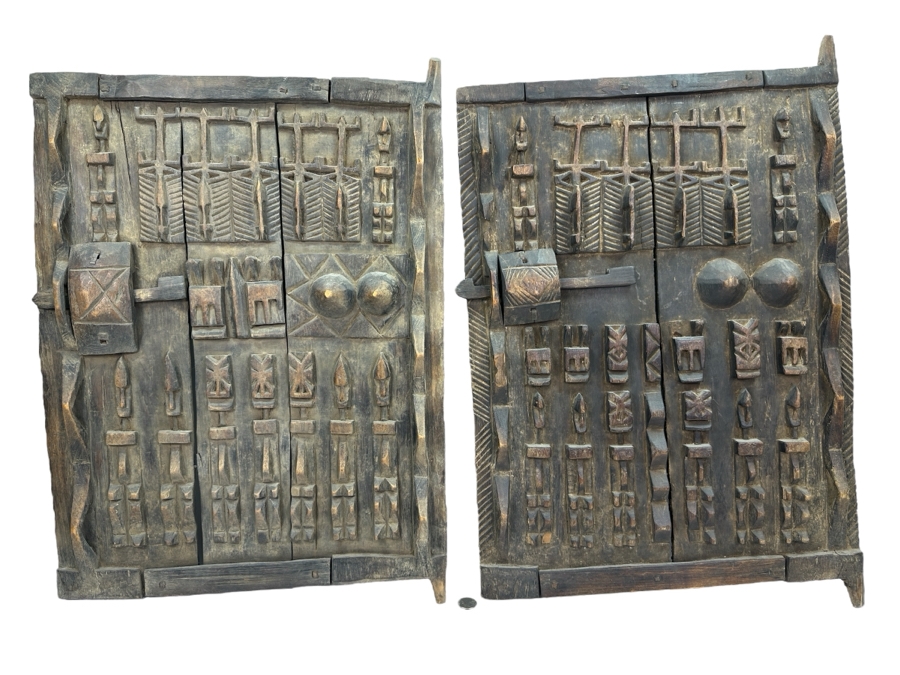 Pair Of Carved Wooden Dogon Granary Doors 18'W X 27'H Estimate $300 [Photo 1]