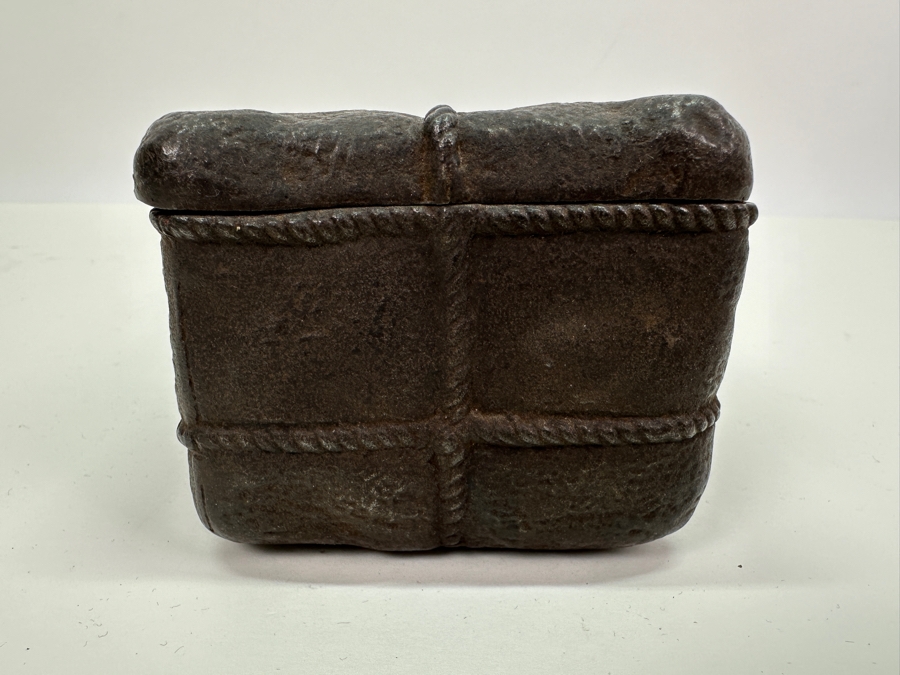 Antique Cast Iron Tobacco Jar In Shape Of A Package Wrapped With Rope Bearing An AR Star, The Number 23, The Word Piano And A Glass With Makers Mark Underneath Box [Photo 15]