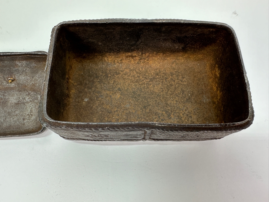 Antique Cast Iron Tobacco Jar In Shape Of A Package Wrapped With Rope Bearing An AR Star, The Number 23, The Word Piano And A Glass With Makers Mark Underneath Box [Photo 9]