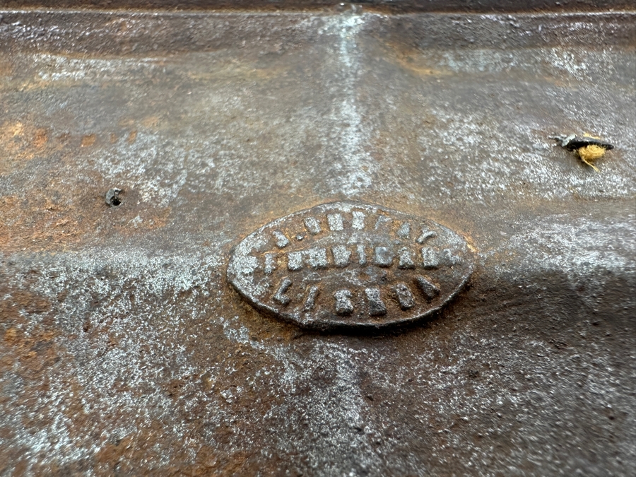 Antique Cast Iron Tobacco Jar In Shape Of A Package Wrapped With Rope Bearing An AR Star, The Number 23, The Word Piano And A Glass With Makers Mark Underneath Box [Photo 12]