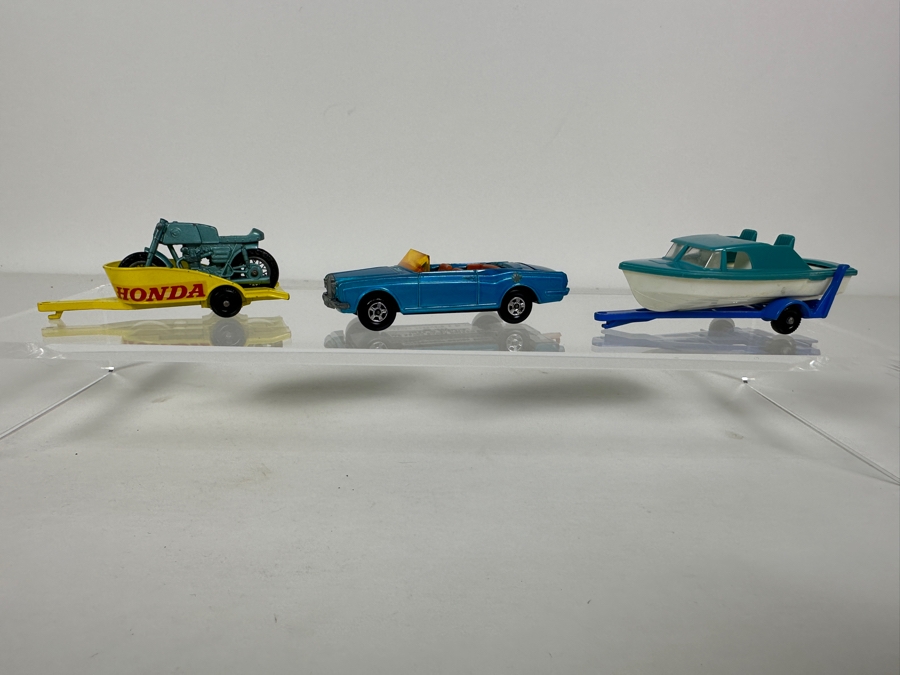 Collection Of Vintage Matchbox Series Lesney Cars: No. 69 Rolls Royce Silver Shadow Coupe 1969, NO. 38 Honda Motorcycle & Trailer And No. 9 Trailer & Boat [Photo 2]