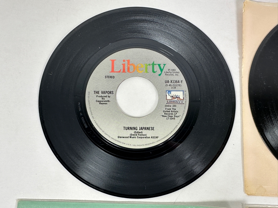 Devo - Working In The Coal Mine 1981, The Vapors - Turning Japanese 1980, Watching The Hydroplanes Clear Vinyl & The Revillos - Hungry For Love 45 Rpm Vinyl Records [Photo 4]