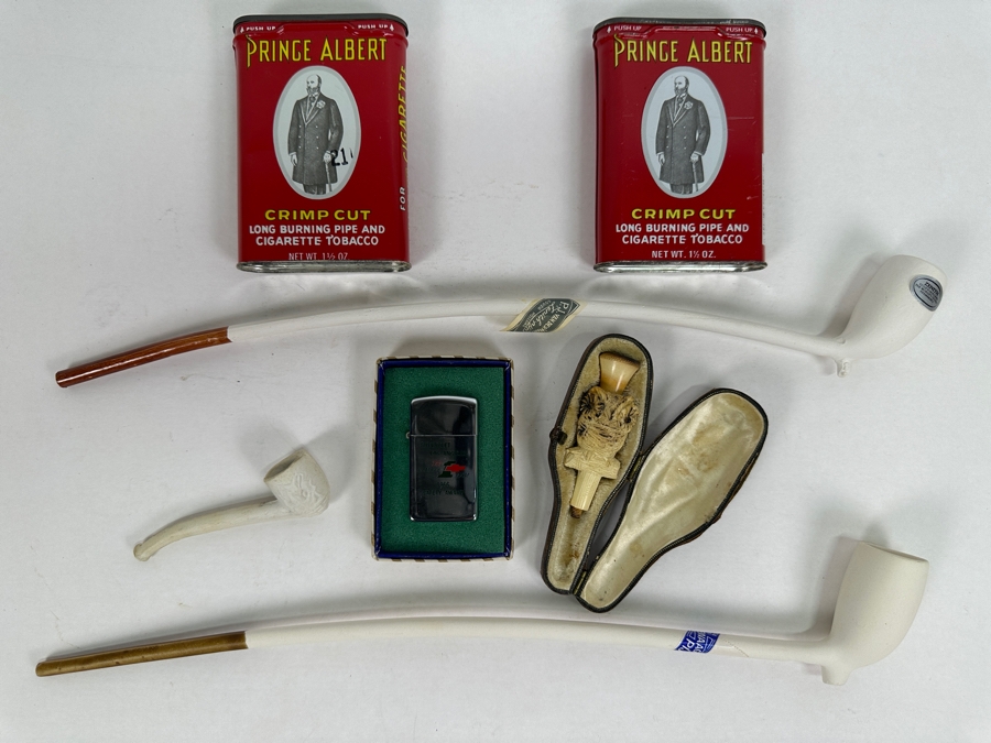 Tobacco Smoking Lot: Pair Of New Gouda Holland Long Porcelain Pipes, A Carved Meerschaum Owl Pipe Without The Stem, Small Porelain Pipe,  Chevrolet Los Angeles 1966 Safety Award PARK Lighter And Pair Of Prince Albert Tins [Photo 2]