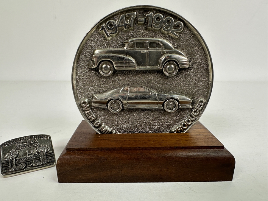 General Motors Van Nuys California 1947-1992 Over 6 Million Vehicles Produced 3' Medallion With Display Stand And Pin [Photo 13]