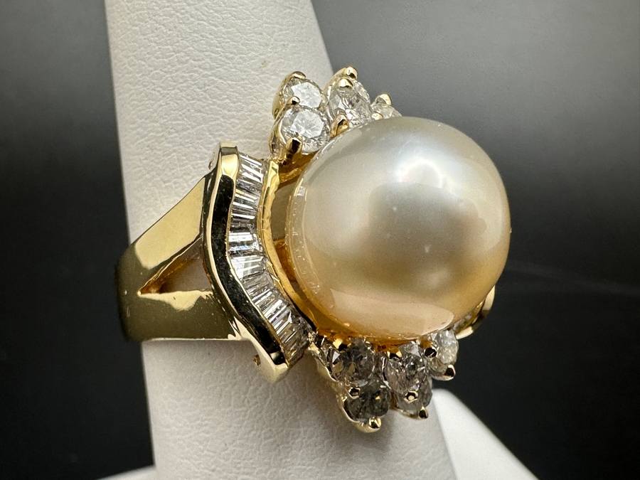 14K Gold Ring (9.6g) with 11mm Cultured Pearl, .80 cttw Round Brilliant Diamonds + .50 cttw Baguette Diamonds Size 7 Fair Market Value $1,700 Retail $3,400 [Photo 8]