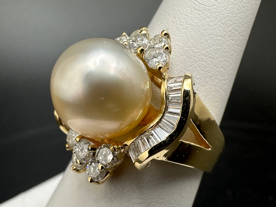14K Gold Ring (9.6g) with 11mm Cultured Pearl, .80 cttw Round Brilliant Diamonds + .50 cttw Baguette Diamonds Size 7 Fair Market Value $1,700 Retail $3,400 [Photo 12]